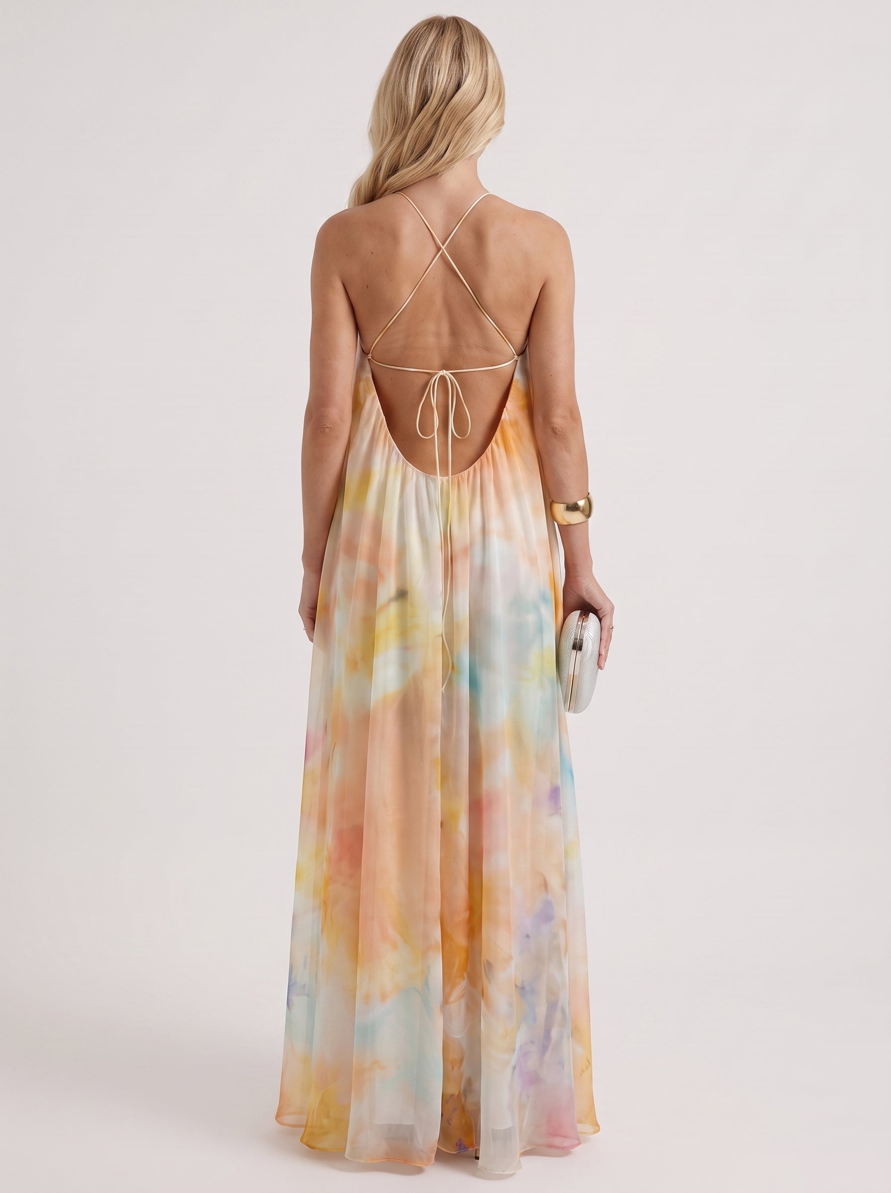 Women orange maxi dress with halter neckline and chiffon fabric