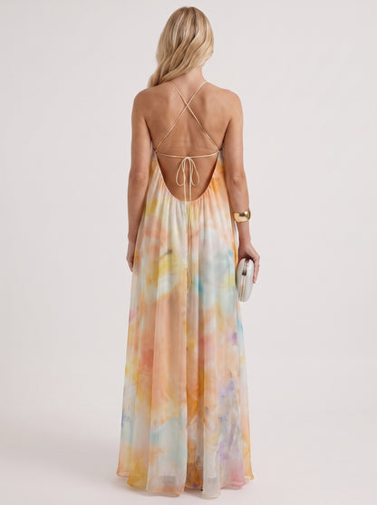 Women orange maxi dress with halter neckline and chiffon fabric