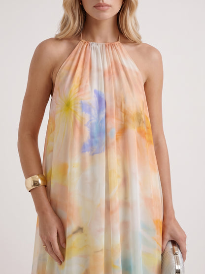 Women orange maxi dress with halter neckline and chiffon fabric