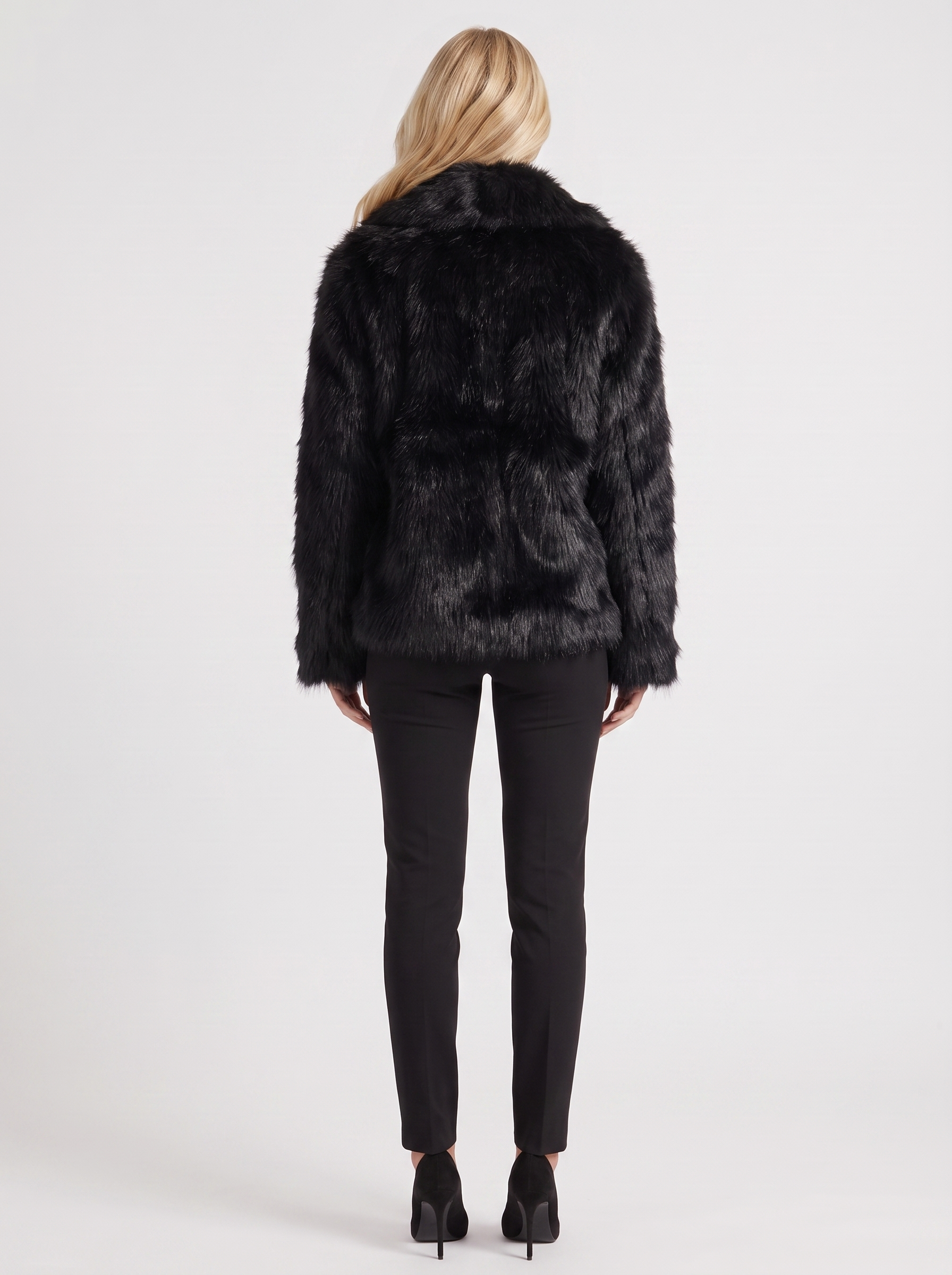 Women's black shaggy jacket with long pile texture and hip length hem
