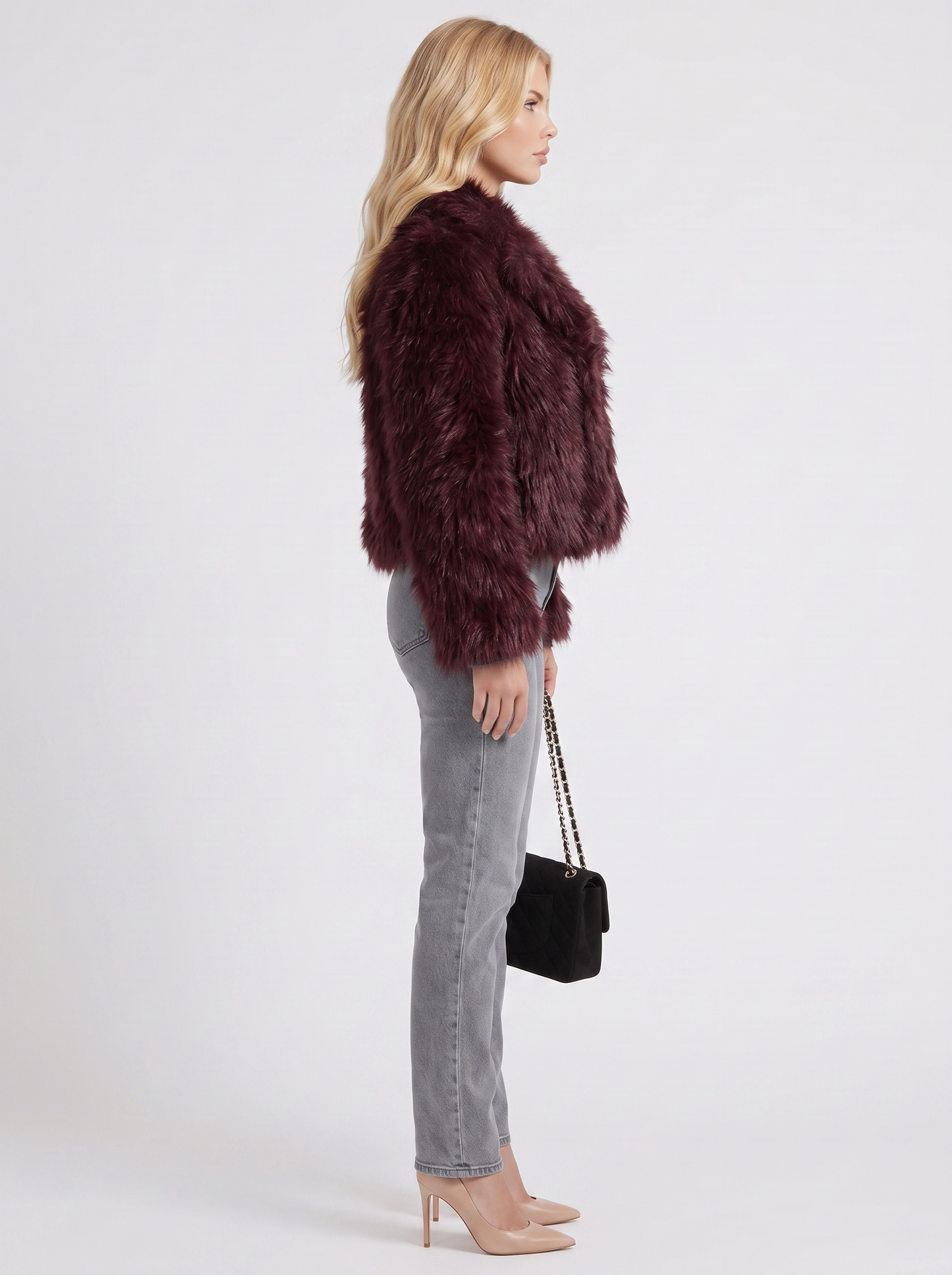 Women's brown shaggy jacket with long pile texture and hip length hem