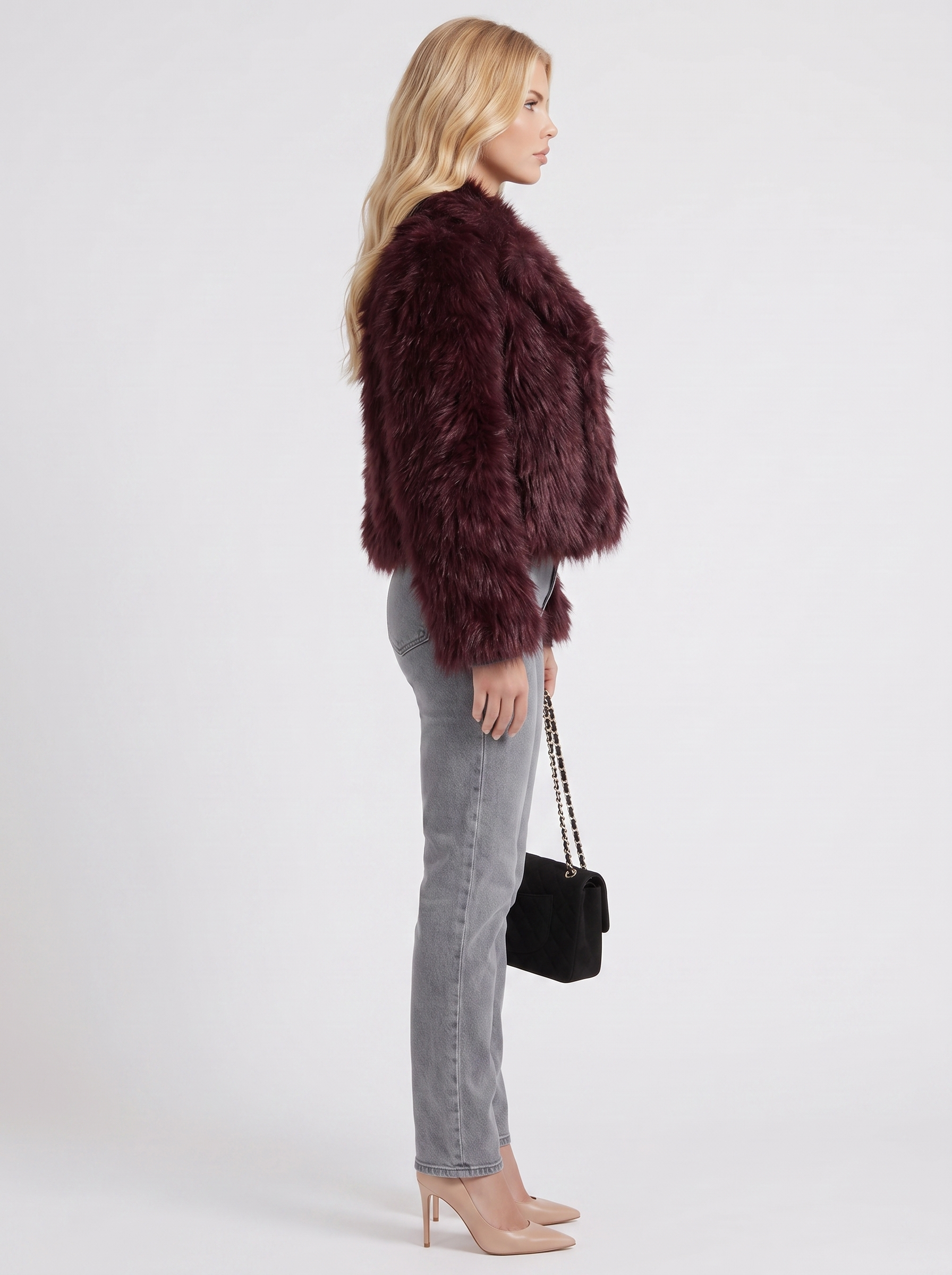 Women's brown shaggy jacket with long pile texture and hip length hem