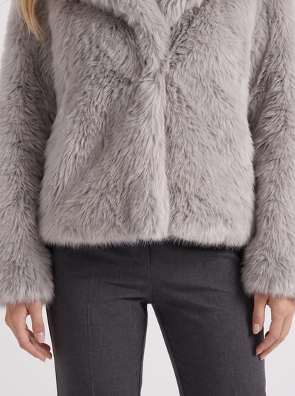Women's light gray shaggy jacket with long pile texture and hip length hem
