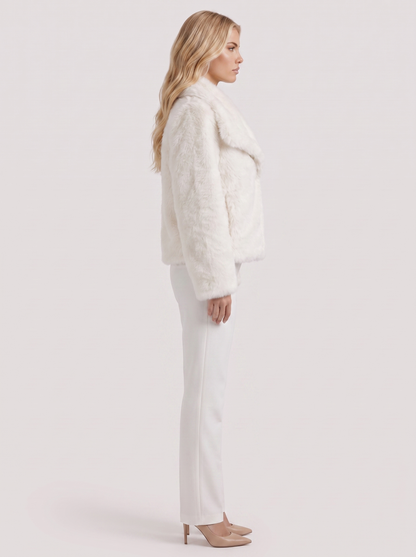 Women's white shaggy jacket with long pile texture and hip length hem