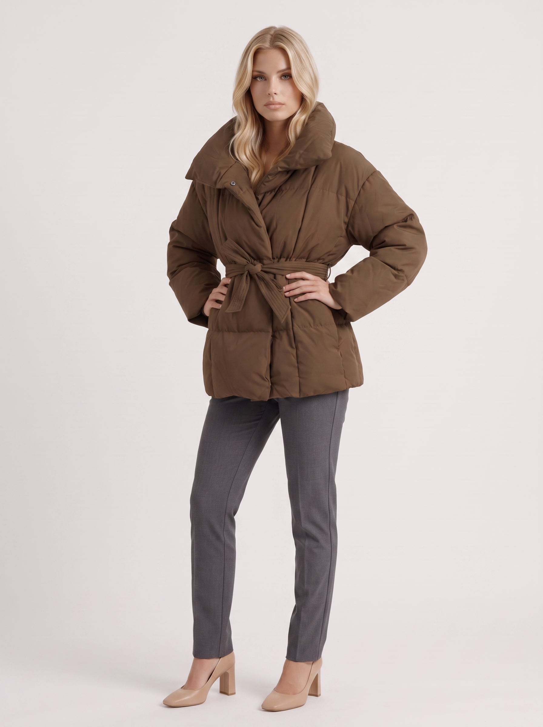 Women's brown puffer jacket with quilted panels and zip front