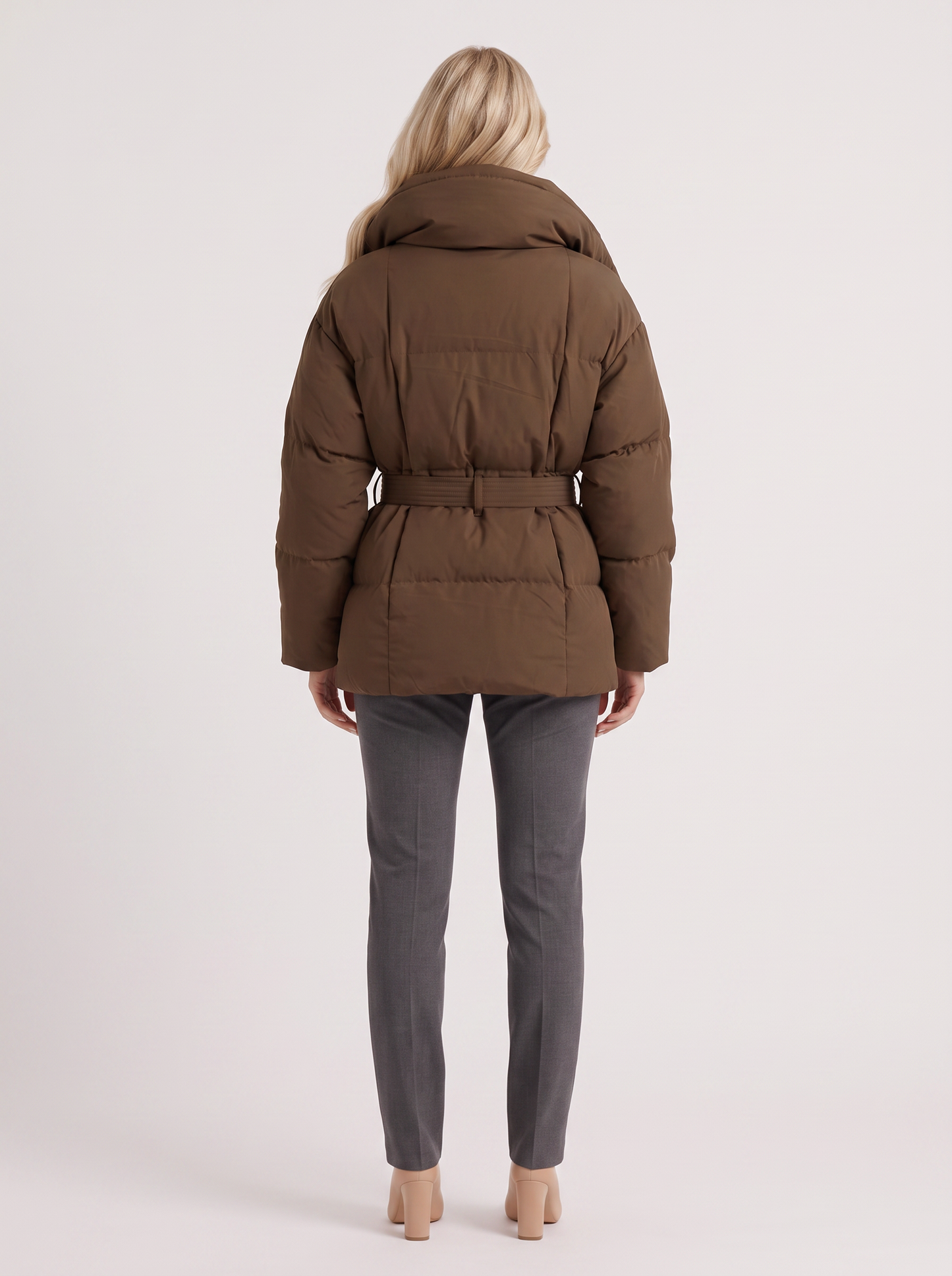 Women's brown puffer jacket with quilted panels and zip front