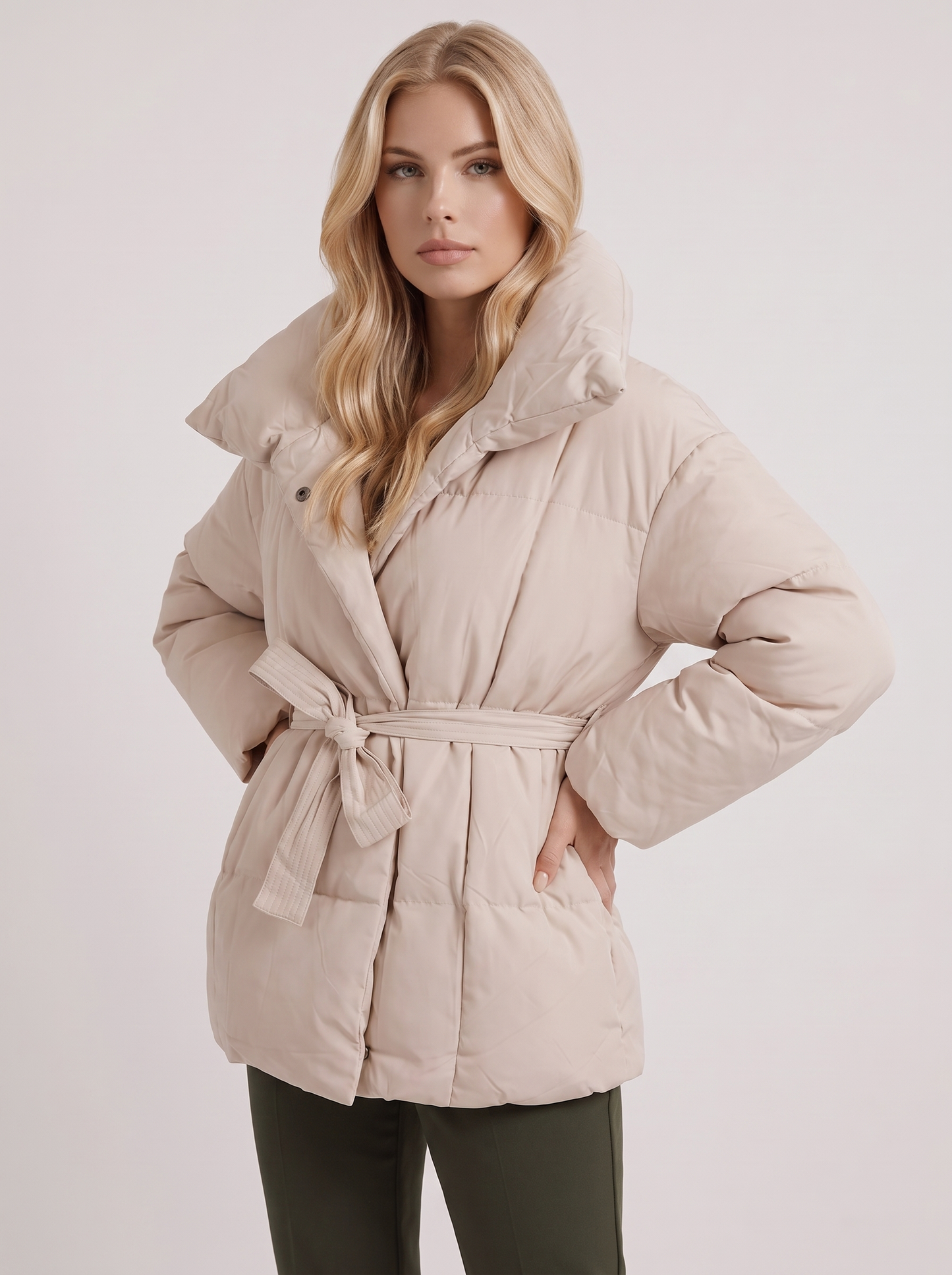 Women's white puffer jacket with quilted panels and zip front