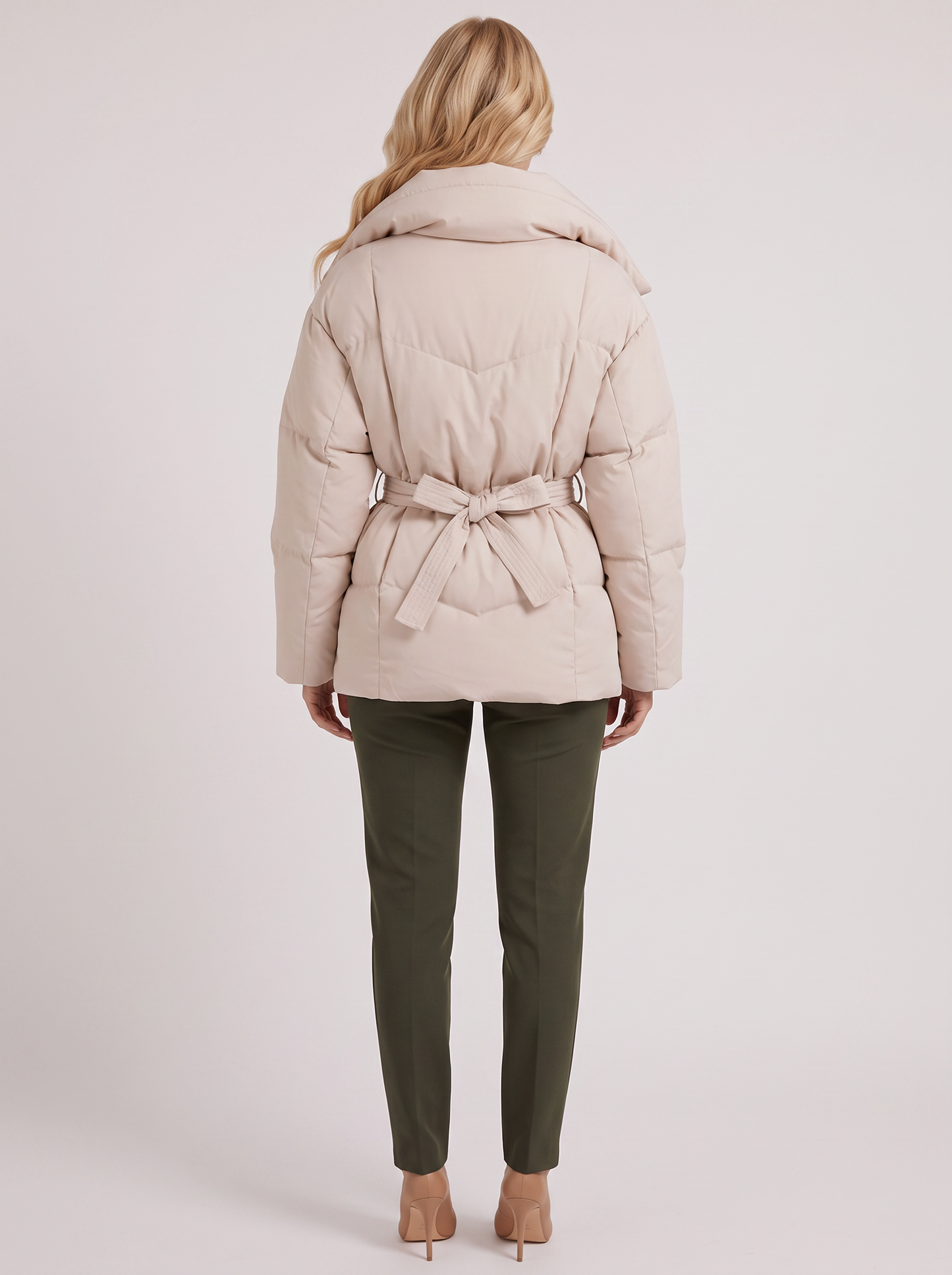 Women's white puffer jacket with quilted panels and zip front