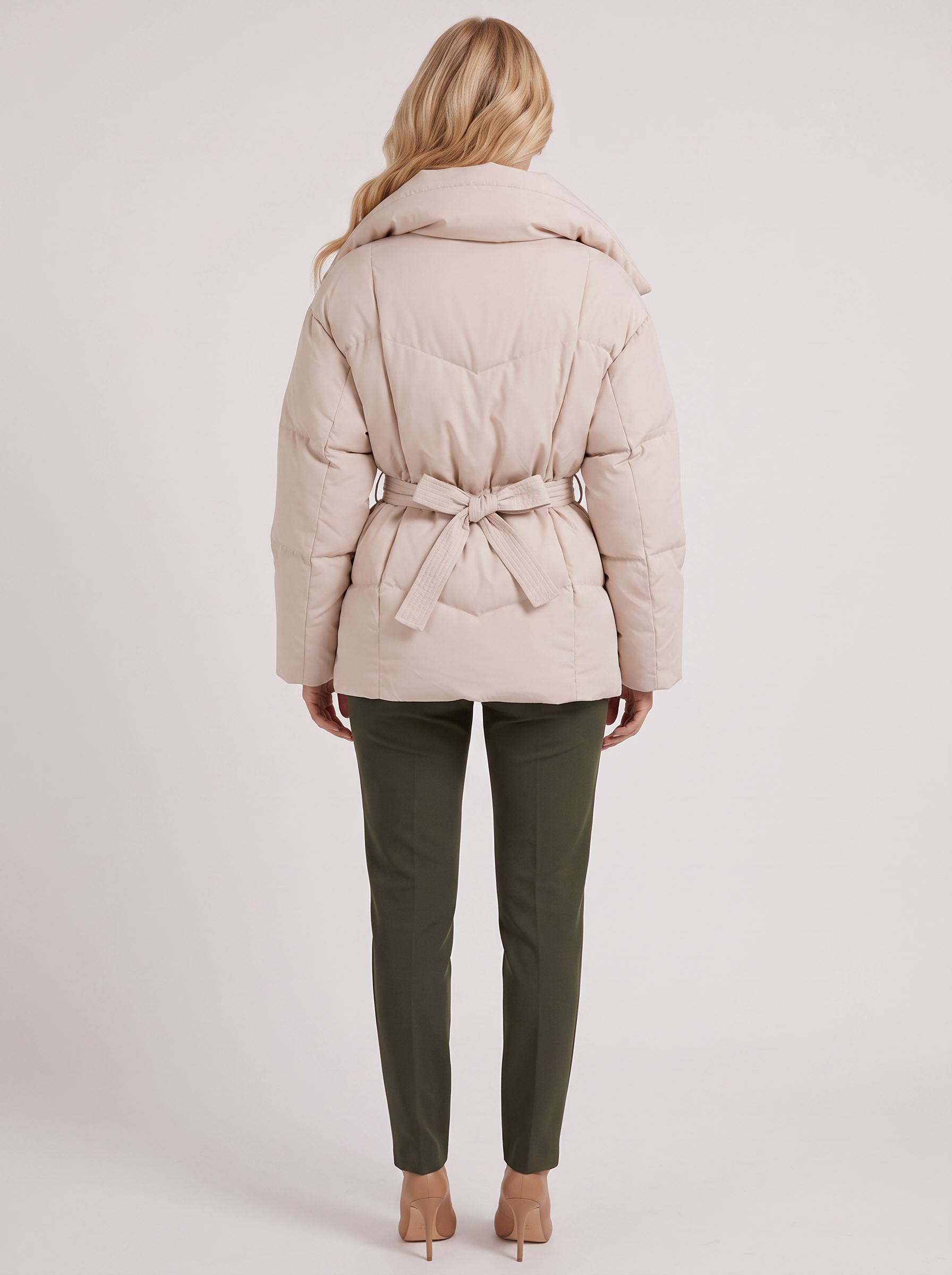 Women's white puffer jacket with quilted panels and zip front