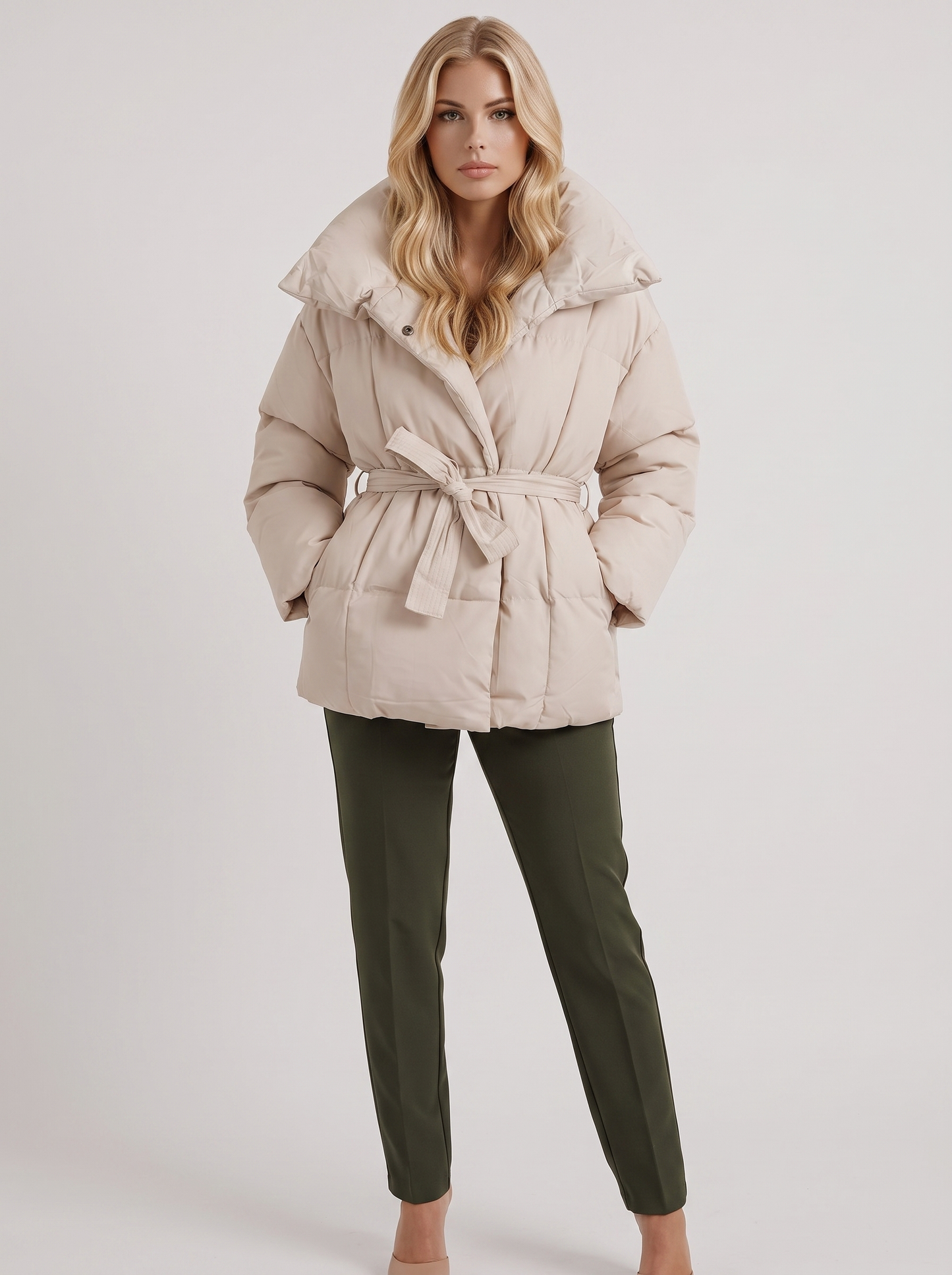 Women's white puffer jacket with quilted panels and zip front