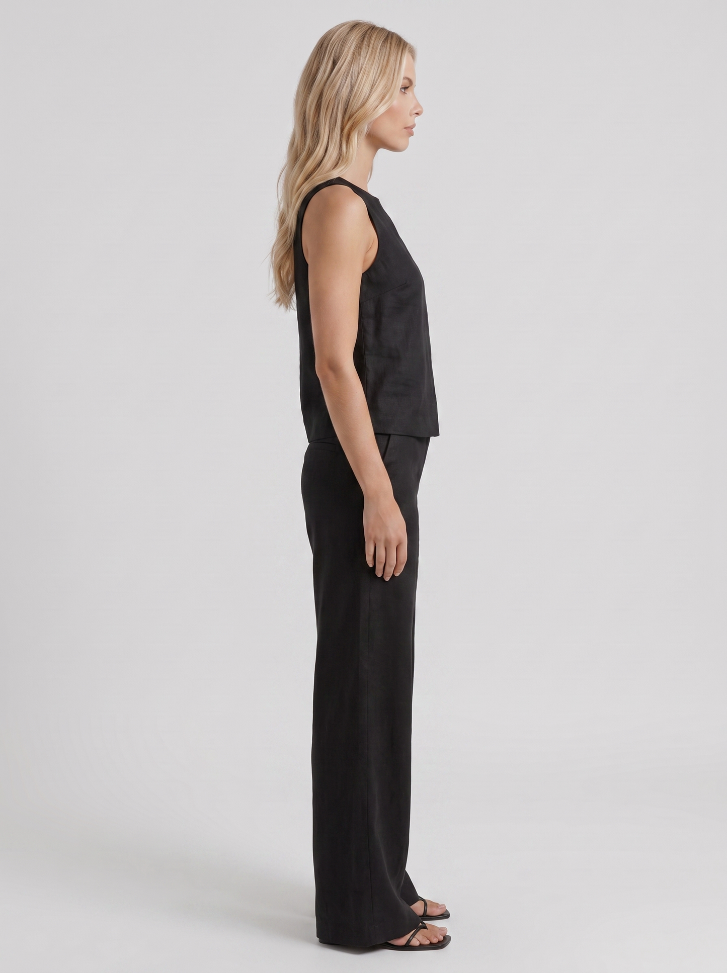 Women black pants set with sleeveless linen top and round neckline