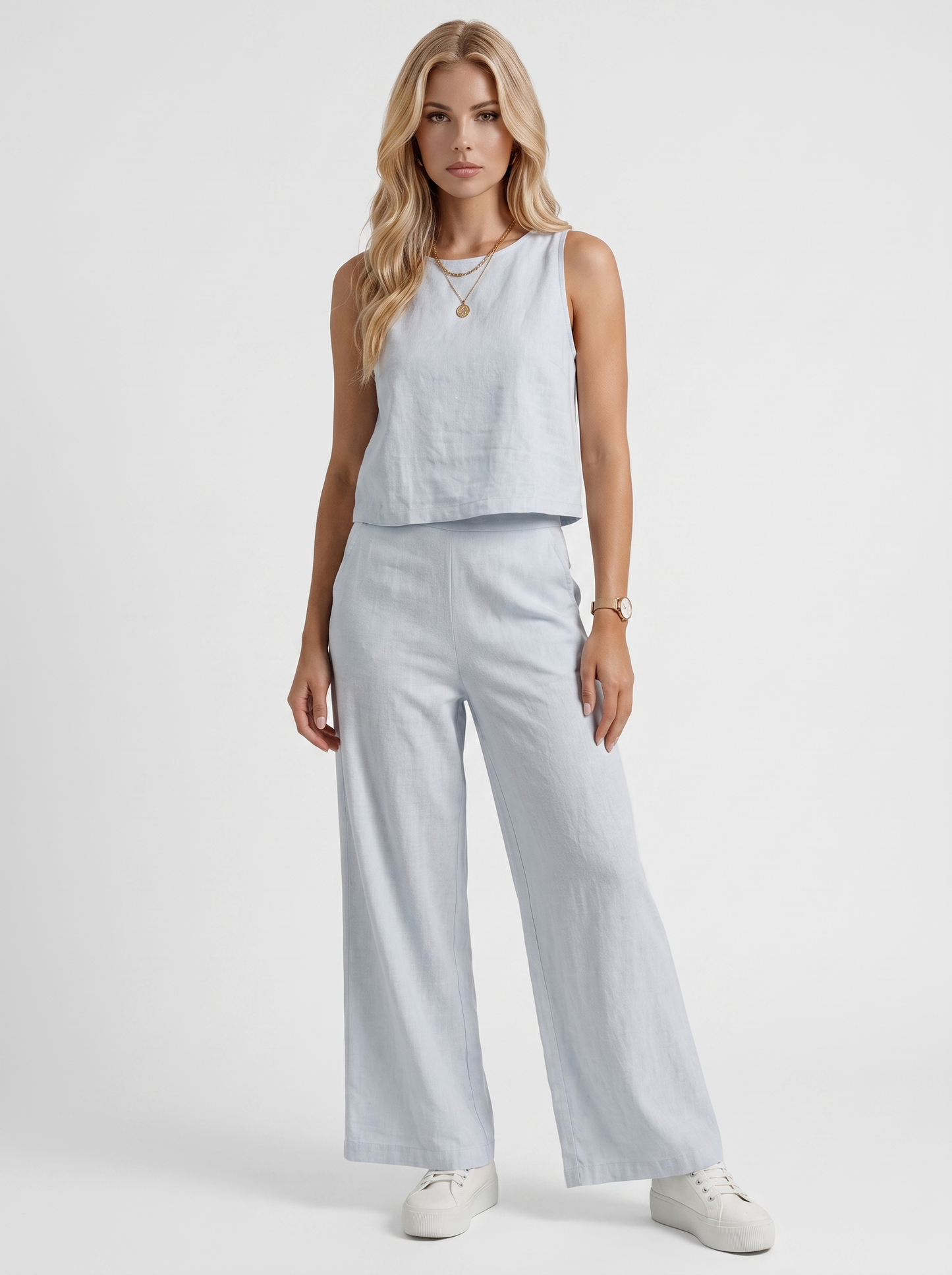 Women white pants set with sleeveless linen top and round neckline