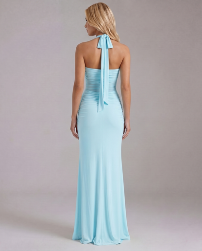 Women's blue maxi dress with ruched back and tied halter straps back view