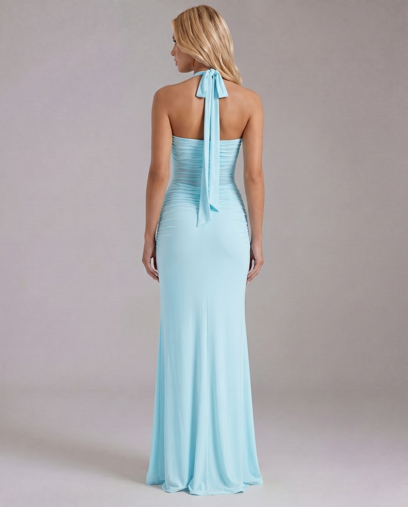 Women's blue maxi dress with ruched back and tied halter straps back view