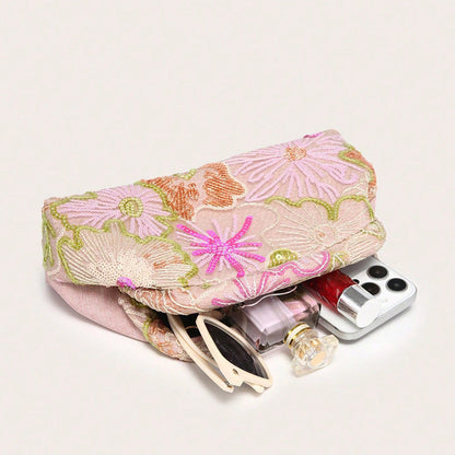 Women pink clutch bag with embroidered detail and sequin finish