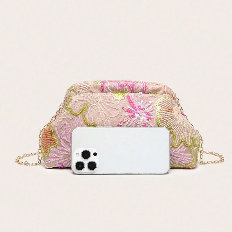 Women pink clutch bag with embroidered detail and sequin finish