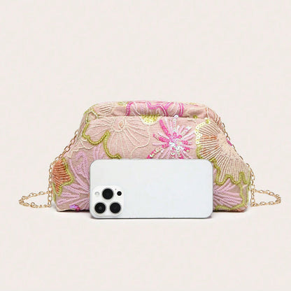 Women pink clutch bag with embroidered detail and sequin finish