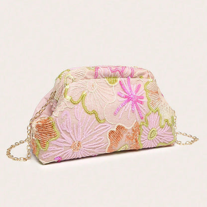 Women pink clutch bag with embroidered detail and sequin finish