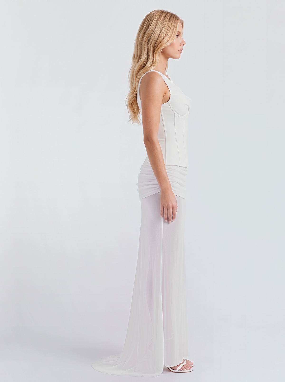 Women white corset two piece set with a wide shoulder strap and a short train, side view